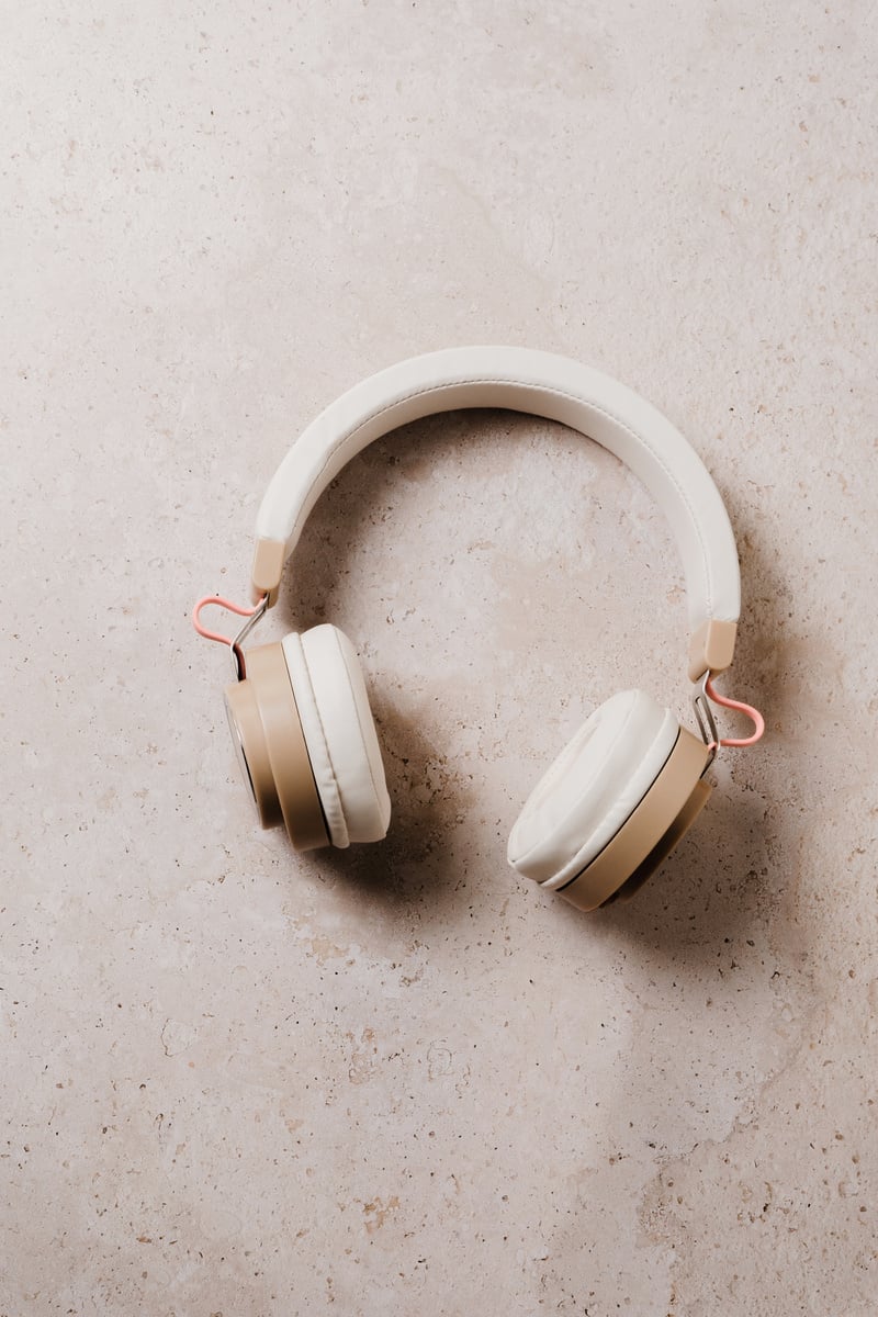 Wireless Headphones on Brown Marble Background